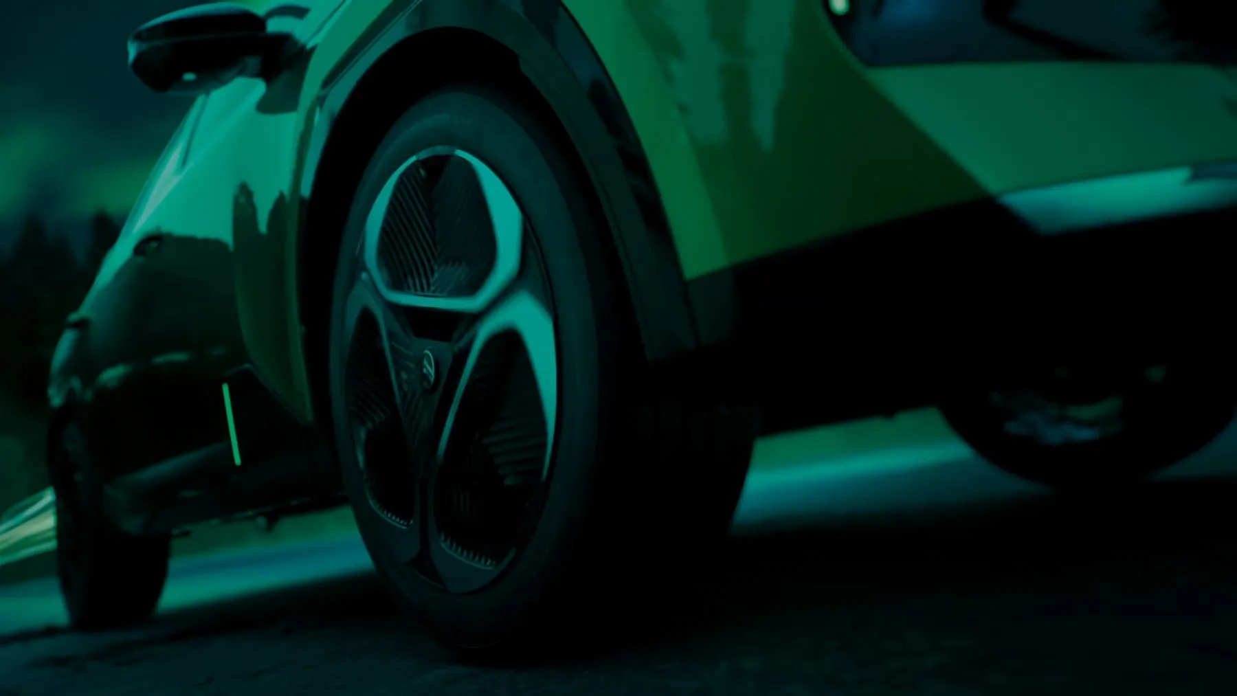 Close on the front wheel and arch, teal grade