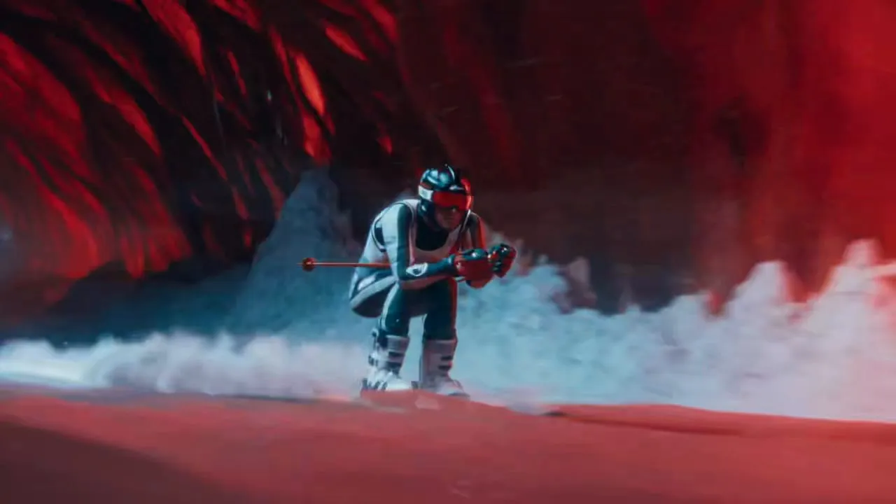 A skier cutting through a red cave of snow and smoke